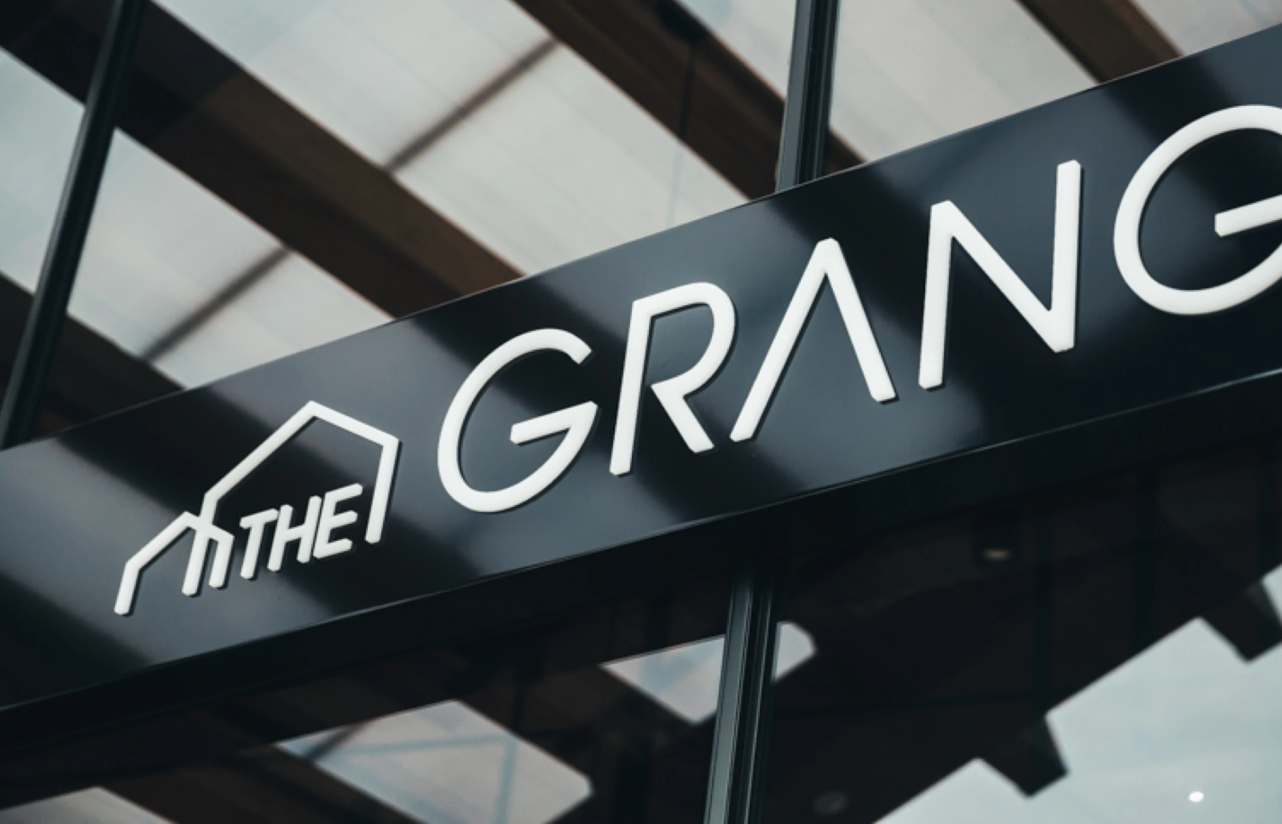logo the grange sign